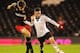 LONDON, ENGLAND - APRIL 07: Patrick Roberts of Fulham U18 and Harry Cardwell of Reading U18 chase the ball during the FA Youth Cup Semi Final second leg match at Craven Cottage on April 7, 2014 in London, England. (Photo by Tom Dulat/Getty Images)
