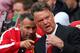 MANCHESTER, ENGLAND - AUGUST 16: Manchester United Manager Louis van Gaal speaks with Assistant Ryan Giggs (L) prior to the Barclays Premier League match between Manchester United and Swansea City at Old Trafford on August 16, 2014 in Manchester, England