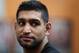 BOLTON, ENGLAND - MAY 12: Amir Khan answers questions from the media during the launch of The Amir Khan Foundation at the at the Gloves Community Centre on May 12, 2014 in Bolton, England. (Photo by Jan Kruger/Getty Images)