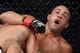 Nov 2, 2013; Long Beach, CA, USA; Eddie Alvarez (red gloves) and Michael Chandler (blue gloves) during their Bellator lightweight world championship fight at the Long Beach Arena. Alvarez won the fight. Mandatory Credit: Jayne Kamin-Oncea-USA TODAY Spor