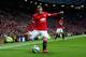 MANCHESTER, ENGLAND - AUGUST 12: Wayne Rooney of Manchester United in action during the Pre Season Friendly match between Manchester United and Valencia at Old Trafford on August 12, 2014 in Manchester, England. (Photo by Clive Brunskill/Getty Images)