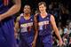 DENVER, CO - December 20: Eric Bledsoe #2 and Goran Dragic #1 of the Phoenix Suns smile and walk off the court against the Denver Nuggets on December 20, 2013 at the Pepsi Center in Denver, Colorado. NOTE TO USER: User expressly acknowledges and agrees t