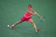 CINCINNATI, OH - AUGUST 15: Simona Halep of Romania hits a return in her match against Maria Sharapova of Russia on Day 7 of the Western & Southern Open on August 15, 2014 at the Linder Family Tennis Center in Cincinnati,Ohio. (Photo by Andy Lyons/Getty