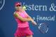 CINCINNATI, OH - AUGUST 15: Simona Halep of Romania hits a return in her match against Maria Sharapova of Russia on Day 7 of the Western & Southern Open on August 15, 2014 at the Linder Family Tennis Center in Cincinnati,Ohio. (Photo by Andy Lyons/Getty