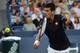 CINCINNATI, OH - AUGUST 12: Novak Djokovic of Serbia returns to Gilles Simon of France during a match on day 4 of the Western & Southern Open on August 12, 2014 in Cincinnati, Ohio. (Photo by Jonathan Moore/Getty Images)