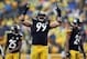 Dec 29, 2013; Pittsburgh, PA, USA; Pittsburgh Steelers defensive end Brett Keisel (99) pumps the crowd up against the Cleveland Browns in the second half at Heinz Field. The Steelers won the game, 20-7. Mandatory Credit: Jason Bridge-USA TODAY Sports