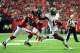 ATLANTA, GA - OCTOBER 20: Mike Williams #19 of the Tampa Bay Buccaneers runs with a catch against Asante Samuel #22 of the Atlanta Falcons at the Georgia Dome on October 20, 2013 in Atlanta, Georgia. (Photo by Scott Cunningham/Getty Images)
