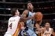 LOS ANGELES, CA - APRIL 13: Ed Davis #32 of the Memphis Grizzlies handles the ball against Ryan Kelly #4 of the Los Angeles Lakers at Staples Center on April 13, 2014 in Los Angeles, California. NOTE TO USER: User expressly acknowledges and agrees that, b