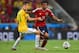 FORTALEZA, BRAZIL - JULY 04: Oscar of Brazil and Juan Guillermo Cuadrado of Colombia compete for the ball during the 2014 FIFA World Cup Brazil Quarter Final match between Brazil and Colombia at Castelao on July 4, 2014 in Fortaleza, Brazil. (Photo by L