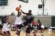 Kyrie Irving (in black) could work well in some triangle offensive sets with James and Love.