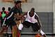 Thon Maker (R) battles 2015 standout Jaylen Brown at Adidas Nations in August 2014.