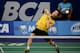 JAKARTA, INDONESIA - JUNE 18: Lee Chong Wei of Malaysia returns a shot against Sony Dwi Kuncoro of Indonesia during the BCA Indonesia Open 2014 MetLife BWF World Super Series Premier at Istora Gelora Bung Karno Stadium on June 18, 2014 in Jakarta, Indone