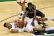 GREENSBORO, NC - MARCH 15: Josh Newkirk #13 of the Pittsburgh Panthers and Akil Mitchell #25 of the Virginia Cavaliers battle for a loose ball during the semifinals of the 2014 Men's ACC Basketball Tournament at Greensboro Coliseum on March 15, 2014 in G