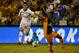 LARNACA, CYPRUS - AUGUST 21: Erik Lamela from Tottenham Hotspur (L) tries to get past Samba Guidileye Dialo from AEL Limassol FC during the AEL Limassol FC v Tottenham Hotspur - UEFA Europa League Qualifying Play-Off match on August 21, 2014 in Larnaca,