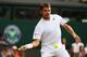 LONDON, ENGLAND - JULY 02: Stan Wawrinka of Switzerland during his Gentlemen's Singles quarter-final match against Roger Federer of Switzerland on day nine of the Wimbledon Lawn Tennis Championships at the All England Lawn Tennis and Croquet Club at Wim