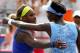 MONTREAL, QC - AUGUST 09: (L-R) Serena Williams of the USA and Venus Williams of the USA hug after the match in which Venus won during the women's semifinals match in the Rogers Cup at Uniprix Stadium on August 9, 2014 in Montreal, Canada. (Photo by Str
