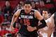 PORTLAND, OR - APRIL 12: Karl Towns Jr #15 of the World Team runs up court against the USA Team on April 12, 2014 at the Moda Center Arena in Portland, Oregon. NOTE TO USER: User expressly acknowledges and agrees that, by downloading and or using this ph