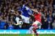 LIVERPOOL, ENGLAND - APRIL 06: Romelu Lukaku of Everton competes with Nacho Monreal of Arsenal during the Barclays Premier League match between Everton and Arsenal at Goodison Park on April 6, 2014 in Liverpool, England. (Photo by Laurence Griffiths/Get