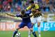 ARNHEM, NETHERLANDS - JULY 30: Marko Vejinovic of Vitesse and Marco van Ginkel of Chelsea battle for the ball during the pre season friendly match between Vitesse Arnhem and Chelsea at the Gelredome Stadium on July 30, 2014 in Arnhem, Netherlands. (Phot