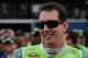 BROOKLYN, MI - AUGUST 17: Kyle Busch, driver of the #18 Interstate Batteries Toyota, stands on the grid prior to the NASCAR Sprint Cup Series Pure Michigan 400 at Michigan International Speedway on August 17, 2014 in Brooklyn, Michigan. (Photo by Robert