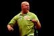 LONDON, ENGLAND - MAY 22: Michael van Gerwen of the Netherlands celebrates winning a leg during the McCoys Premier League Darts Play-Offs Semi Final match between Michael van Gerwen and Gary Anderson at O2 Arena on May 22, 2014 in London, England. (Photo