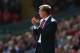 LIVERPOOL, ENGLAND - AUGUST 17: Brendan Rodgers, manager of Liverpool applauds his team during the Barclays Premier League match between Liverpool and Southampton at Anfield on August 17, 2014 in Liverpool, England. (Photo by Alex Livesey/Getty Images)