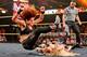 Becky Lynch nails Charlotte with a leg drop.