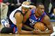 DALLAS, TX - NOVEMBER 18: (L-R) Vince Carter #25 of the Dallas Mavericks and Thaddeus Young #21 of the Philadelphia 76ers hold on to the ball on a jump ball call at American Airlines Center on November 18, 2013 in Dallas, Texas. NOTE TO USER: User expre