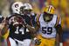 BATON ROUGE, LA - SEPTEMBER 21: Nick Marshall #14 of the Auburn Tigers looks to throw a pass against the LSU Tigers at Tiger Stadium on September 21, 2013 in Baton Rouge, Louisiana. (Photo by Chris Graythen/Getty Images)