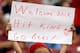 CINCINNATI - SEPTEMBER 11: A fan holds up a sign during the ceremony celebrating the 25th anniversary of Pete Rose breaking the career hit record . Rose was honored before the start of the game between the Pittsburg Pirates and the Cincinnati Reds at Gre