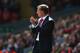 LIVERPOOL, ENGLAND - AUGUST 17: Brendan Rodgers, manager of Liverpool applauds his team during the Barclays Premier League match between Liverpool and Southampton at Anfield on August 17, 2014 in Liverpool, England. (Photo by Alex Livesey/Getty Images)