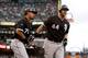 SAN FRANCISCO, CA - AUGUST 12: Adam Dunn #44 of the Chicago White Sox is congratulated by Jose Abreu #79 after he hit a two-run home run in the first inning against the San Francisco Giants at AT&T Park on August 12, 2014 in San Francisco, California. (
