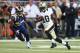 ST. LOUIS, MO - AUGUST 8: Brandin Cooks #10 of the New Orleans Saints runs upfield after making a catch against E.J. Gaines #33 of the St. Louis Rams during the second half of a pre-season game at the Edward Jones Dome on August 8, 2013 in St. Louis, Miss
