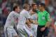 MADRID, SPAIN - AUGUST 19: Gareth Bale (L) Pepe and Sergio Ramos argue with referee Estrada Fernandez during the Supercopa first leg match between Real Madrid and Club Atletico de Madrid at Estadio Santiago Bernabeu on August 19, 2014 in Madrid, Spain.