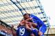 LONDON, ENGLAND - AUGUST 23: Diego Costa of Chelsea is mobbed by team mates after scoring their first goal during the Barclays Premier League match between Chelsea and Leicester City at Stamford Bridge on August 23, 2014 in London, England. (Photo by Pa