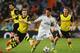 MADRID, SPAIN - APRIL 02: Isco of Real Madrid is closed down by Marco Reus (L) of Borussia Dortmund during the UEFA Champions League Quarter Final first leg match between Real Madrid and Borussia Dortmund at Estadio Santiago Bernabeu on April 2, 2014 in