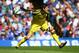 LONDON, ENGLAND - AUGUST 23: Thibaut Courtois of Chelsea rolls the ball out during the Barclays Premier League match between Chelsea and Leicester City at Stamford Bridge on August 23, 2014 in London, England. (Photo by Paul Gilham/Getty Images)
