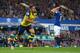 LIVERPOOL, ENGLAND - AUGUST 23: Olivier Giroud of Arsenal celebrates scoring his team's second goal during the Barclays Premier League match between Everton and Arsenal at Goodison Park on August 23, 2014 in Liverpool, England. (Photo by Clive Brunskill