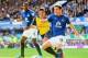 Alexis Sanchez, seen here combating Sylvain Distin and Gareth Barry, endured a difficult time despite working hard in the first-half.