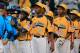 SOUTH WILLIAMSPORT, PA - AUGUST 23: Members of the Great Lakes Team from Chicago, Illinois shakes hands with members of the West Team from Las Vegas, Nevada following their 7-5 win during the United States Championship game of the Little League World Ser