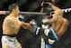 Aug 23, 2014; Tulsa, OK, USA; Wilson Reis (red gloves) fights Joby Sanchez (blue gloves) in the flyweight division fight at BOK Center. Mandatory Credit: Mark D. Smith-USA TODAY Sports