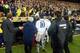 BARCELONA - NOVEMBER 23: Luis Figo of Real Madrid leaves the pitch as play was suspended during the La Liga match between FC Barcelona and Real Madrid played at the Nou Camp Stadium, Barcelona, Spain on November 23, 2002. (Photo by Firo Foto/Getty Images