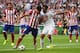 LISBON, PORTUGAL - MAY 24: Diego Costa of Club Atletico de Madrid holds off Sami Khedira of Real Madrid during the UEFA Champions League Final between Real Madrid and Atletico de Madrid at Estadio da Luz on May 24, 2014 in Lisbon, Portugal. (Photo by Sh