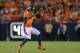 DENVER, CO - AUGUST 23: Wide receiver Andre Caldwell #12 of the Denver Broncos has a reception for a first down against the Houston Texans during a preseason game at Sports Authority Field at Mile High on August 23, 2014 in Denver, Colorado. (Photo by J