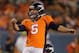 DENVER, CO - AUGUST 07: Place kicker Matt Prater #5 of the Denver Broncos kicks a field goal from the hold of Britton Colquitt #4 of the Denver Broncos against the Seattle Seahawks during preseason action at Sports Authority Field at Mile High on August