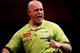 LONDON, ENGLAND - JANUARY 1: Michael van Gerwen of the Netherlands celebrates against Phil Taylor of England during the final of the 2013 Ladbrokes.com World Darts Championship at the Alexandra Palace on January 1, 2013 in London, England. (Photo by Ben