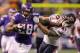 MINNEAPOLIS, MN - DECEMBER 1: Adrian Peterson #28 of the Minnesota Vikings carries the ball for ten thousand career rushing yards against Chris Conte #47 of the Chicago Bears on December 1, 2013 at Mall of America Field at the Hubert Humphrey Metrodome i