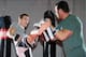 CALGARY, CANADA - APRIL 9: Jordan Mein works on his strikes with his father Lee Mein during a public training session on April 9, 2013 at Champion's Creed Gym in Calgary, Alberta, Canada. (Photo by Derek Leung/Getty Images)