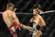 Aug 23, 2014; Tulsa, OK, USA; Mike Pyle (red gloves) fights Jordan Mein (blue gloves) in a Welterweight Bout at BOK Center. Mandatory Credit: Mark D. Smith-USA TODAY Sports