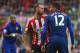 SUNDERLAND, ENGLAND - AUGUST 24: Steven Fletcher of Sunderland confronts Chris Smalling of Manchester United during the Barclays Premier League match between Sunderland and Manchester United at Stadium of Light on August 24, 2014 in Sunderland, England.